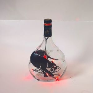 Meukow vs cognac bottle light